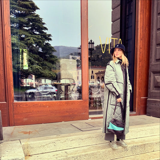 From military life to the city: women and the long coat.
